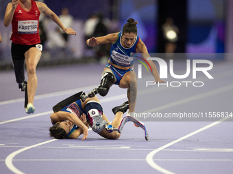 Ambra Sabatini (R) of Italy gets in Monica Contafatto's (ITA) way and makes her fall during the Women's 100m - T63 Final at Stade de France...