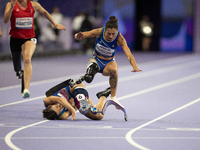 Ambra Sabatini (R) of Italy gets in Monica Contafatto's (ITA) way and makes her fall during the Women's 100m - T63 Final at Stade de France...