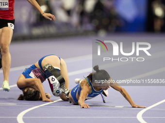 Ambra Sabatini (R) of Italy gets in Monica Contafatto's (ITA) way and makes her fall during the Women's 100m - T63 Final at Stade de France...