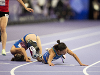 Ambra Sabatini (R) of Italy gets in Monica Contafatto's (ITA) way and makes her fall during the Women's 100m - T63 Final at Stade de France...