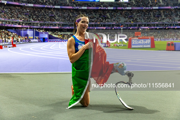 Martina Caironi of Italy reacts after she wins the Women's 100m - T63 Final at State de France during the Paris 2024 Paralympic Games in Par...