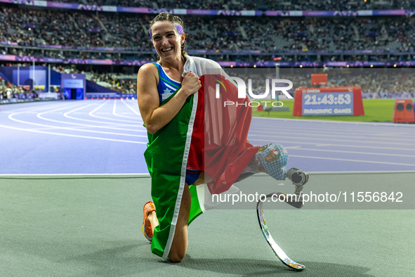 Martina Caironi of Italy reacts after she wins the Women's 100m - T63 Final at State de France during the Paris 2024 Paralympic Games in Par...