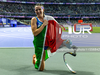 Martina Caironi of Italy reacts after she wins the Women's 100m - T63 Final at State de France during the Paris 2024 Paralympic Games in Par...