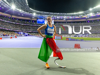 Martina Caironi of Italy reacts after she wins the Women's 100m - T63 Final at State de France during the Paris 2024 Paralympic Games in Par...