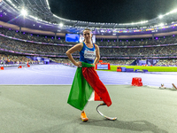 Martina Caironi of Italy reacts after she wins the Women's 100m - T63 Final at State de France during the Paris 2024 Paralympic Games in Par...