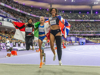 Karisma Tiarani of Indonesia, Martina Caironi of Italy, and Okoh Ndidikama of the UK react after the Women's 100m - T63 Final at Stade de Fr...