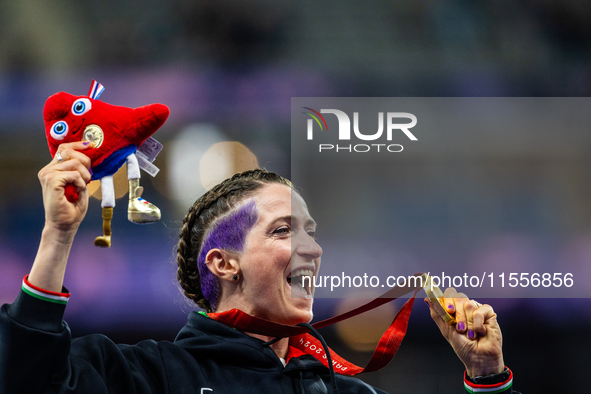 Martina Caironi of Italy wins a gold medal in the Women's 100m - T63 Final at Stade de France during the Paris 2024 Paralympic Games in Pari...