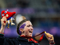 Martina Caironi of Italy wins a gold medal in the Women's 100m - T63 Final at Stade de France during the Paris 2024 Paralympic Games in Pari...