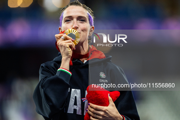 Martina Caironi of Italy wins a gold medal in the Women's 100m - T63 Final at Stade de France during the Paris 2024 Paralympic Games in Pari...