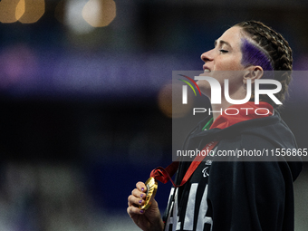 Martina Caironi of Italy wins a gold medal in the Women's 100m - T63 Final at Stade de France during the Paris 2024 Paralympic Games in Pari...