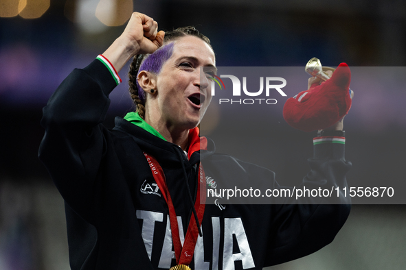 Martina Caironi of Italy wins a gold medal in the Women's 100m - T63 Final at Stade de France during the Paris 2024 Paralympic Games in Pari...