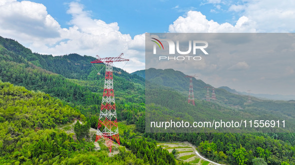 The iron tower of the 800 kV UHVDC power transmission project is built in Jinshang-Hubei Province, Chongqing, China, on September 7, 2024. T...