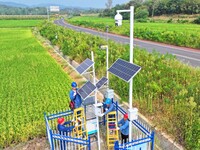 Workers carry out an overhaul of intelligent agricultural monitoring equipment in Chuzhou, China, on September 7, 2024. (