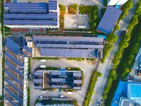 Photovoltaic panels are installed on the roofs of enterprises in Yuexi Economic Development Zone in Anqing, China, on September 8, 2024. (