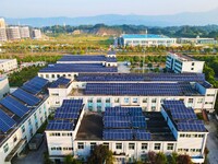 Photovoltaic panels are installed on the roofs of enterprises in Yuexi Economic Development Zone in Anqing, China, on September 8, 2024. (