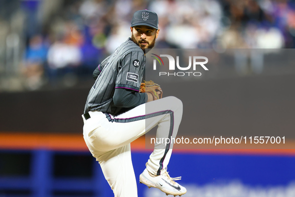 New York Mets relief pitcher Danny Young #81 throws during the eighth inning of the baseball game against the Cincinnati Reds at Citi Field...