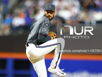 New York Mets relief pitcher Danny Young #81 throws during the eighth inning of the baseball game against the Cincinnati Reds at Citi Field...