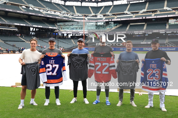 From left to right, New York Islanders Anders Lee, New York Mets Brandon Nimmo, New Jersey Devils Brett Pesce, New York Mets David Peterson,...