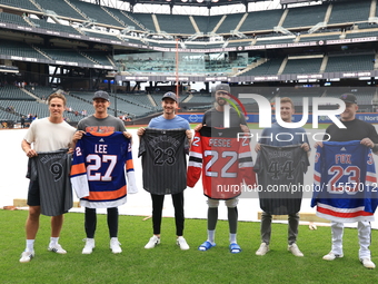 From left to right, New York Islanders Anders Lee, New York Mets Brandon Nimmo, New Jersey Devils Brett Pesce, New York Mets David Peterson,...