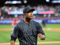 New York Mets starting pitcher Jose Quintana #62 leaves the game during the seventh inning of the baseball game against the Cincinnati Reds...