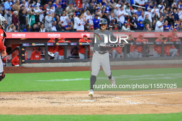 Brandon Nimmo #9 of the New York Mets scores during the sixth inning of the baseball game against the Cincinnati Reds at Citi Field in Coron...