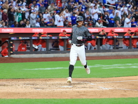 Brandon Nimmo #9 of the New York Mets scores during the sixth inning of the baseball game against the Cincinnati Reds at Citi Field in Coron...