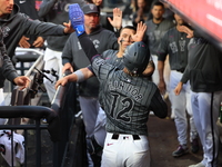 Francisco Lindor #12 of the New York Mets scores during the sixth inning of the baseball game against the Cincinnati Reds at Citi Field in C...