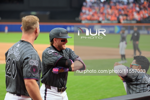 Harrison Bader #44 of the New York Mets celebrates with a teammate after hitting a home run during the sixth inning of the baseball game aga...