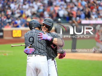 Harrison Bader #44 of the New York Mets celebrates with a teammate after hitting a home run during the sixth inning of the baseball game aga...