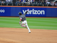 Harrison Bader #44 of the New York Mets rounds the bases after hitting a home run during the sixth inning of the baseball game against the C...