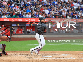 Harrison Bader #44 of the New York Mets connects for a home run during the sixth inning of the baseball game against the Cincinnati Reds at...