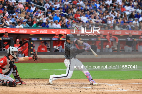 Harrison Bader #44 of the New York Mets connects for a home run during the sixth inning of the baseball game against the Cincinnati Reds at...