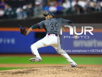 New York Mets relief pitcher Edwin Diaz #39 throws during the ninth inning of the baseball game against the Cincinnati Reds at Citi Field in...