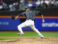 New York Mets relief pitcher Edwin Diaz #39 throws during the ninth inning of the baseball game against the Cincinnati Reds at Citi Field in...