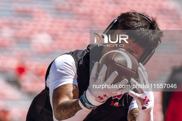 Wisconsin Badgers wide receiver Trech Kekahuna #2 warms up at Camp Randall Stadium in Madison, Wisconsin, on September 7, 2024. 