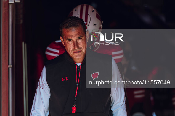 Wisconsin Badgers Head Coach Luke Fickell walks out of the tunnel at Camp Randall Stadium in Madison, Wisconsin, on September 7, 2024. 