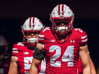 Wisconsin Badgers safety Hunter Wohler #24 walks out of the tunnel at Camp Randall Stadium in Madison, Wisconsin, on September 7, 2024. (