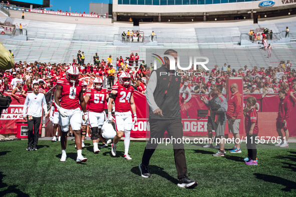 Wisconsin Badgers Head Coach Luke Fickell leads the Wisconsin Badgers onto the field at Camp Randall Stadium in Madison, Wisconsin, on Septe...