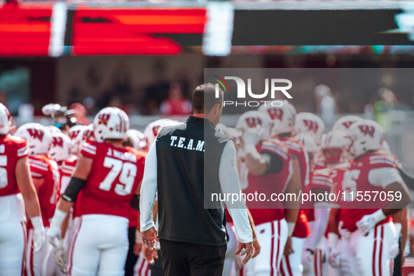 Wisconsin Badgers Head Coach Luke Fickell watches over his team at Camp Randall Stadium in Madison, Wisconsin, on September 7, 2024. 