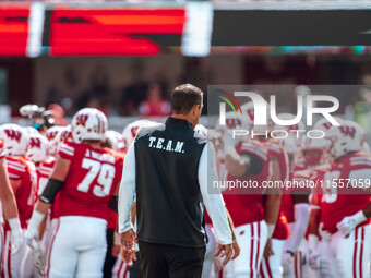 Wisconsin Badgers Head Coach Luke Fickell watches over his team at Camp Randall Stadium in Madison, Wisconsin, on September 7, 2024. (