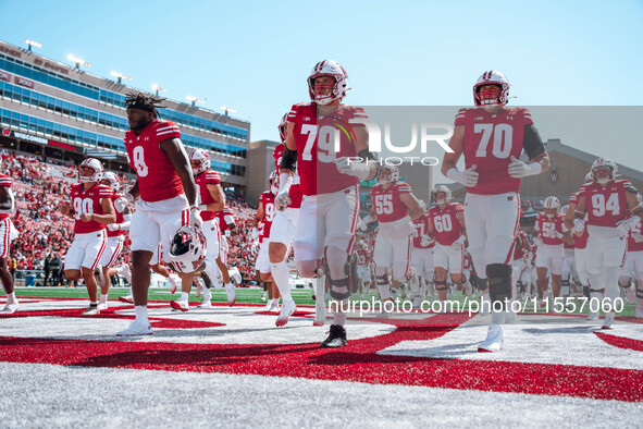 Wisconsin Badgers offensive linemen Jack Nelson #79 and Barrett Nelson #70 are at Camp Randall Stadium in Madison, Wisconsin, on September 7...