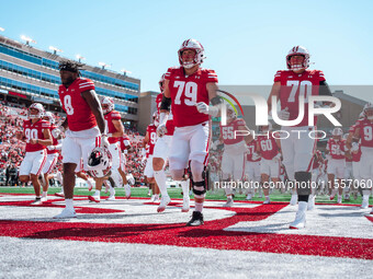 Wisconsin Badgers offensive linemen Jack Nelson #79 and Barrett Nelson #70 are at Camp Randall Stadium in Madison, Wisconsin, on September 7...