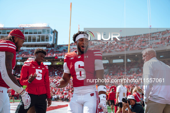 Wisconsin Badgers wide receiver Will Pauling #6 gets ready to take on the South Dakota Coyotes at Camp Randall Stadium in Madison, Wisconsin...