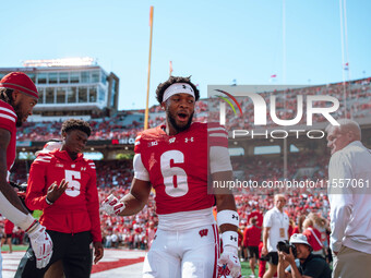 Wisconsin Badgers wide receiver Will Pauling #6 gets ready to take on the South Dakota Coyotes at Camp Randall Stadium in Madison, Wisconsin...