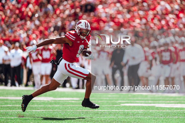 Wisconsin Badgers wide receiver Bryson Green #9 outruns the defense of the South Dakota Coyotes at Camp Randall Stadium in Madison, Wisconsi...