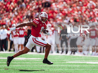 Wisconsin Badgers wide receiver Bryson Green #9 outruns the defense of the South Dakota Coyotes at Camp Randall Stadium in Madison, Wisconsi...