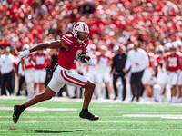 Wisconsin Badgers wide receiver Bryson Green #9 outruns the defense of the South Dakota Coyotes at Camp Randall Stadium in Madison, Wisconsi...