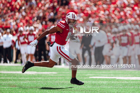 Wisconsin Badgers wide receiver Bryson Green #9 outruns the defense of the South Dakota Coyotes at Camp Randall Stadium in Madison, Wisconsi...