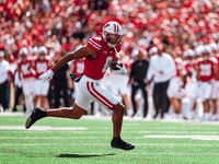 Wisconsin Badgers wide receiver Bryson Green #9 outruns the defense of the South Dakota Coyotes at Camp Randall Stadium in Madison, Wisconsi...