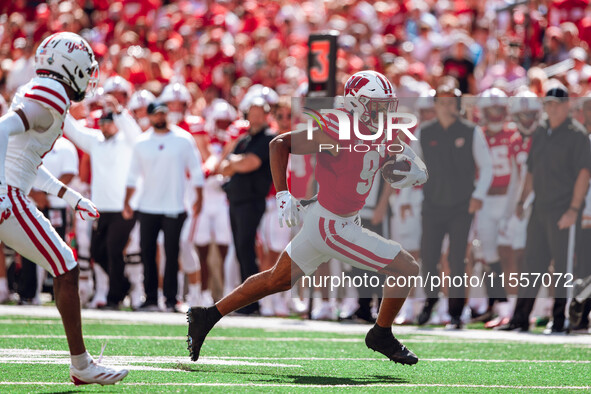 Wisconsin Badgers wide receiver Bryson Green #9 outruns the defense of the South Dakota Coyotes at Camp Randall Stadium in Madison, Wisconsi...